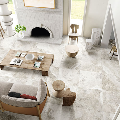 Immagine dall'alto del pavimento di un living in un moderno appartamento, serie Bloom colore Grey