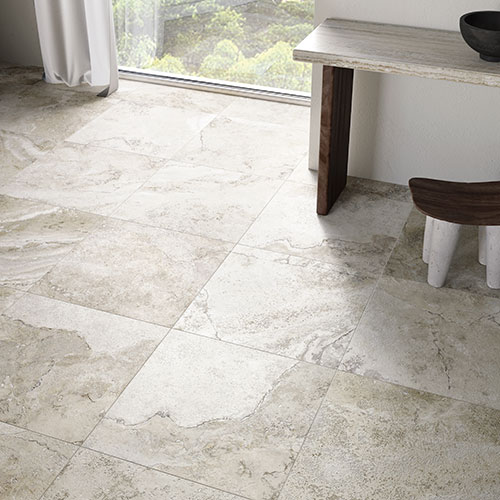 Particolare del pavimento di un living in un moderno appartamento, serie Bloom colore Grey