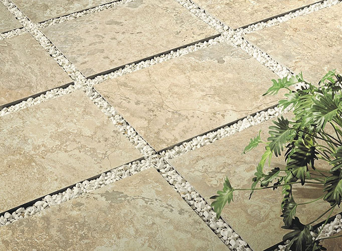 Dettaglio di pavimento Bone 2 cm, collezione Instone, effetto pietra.