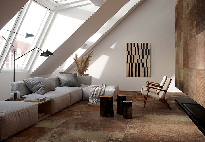 Living room realizzata con pavimento della collezione Melt, variante Oxid