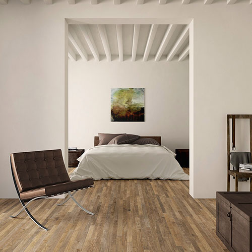 Ambiente camera realizzato con pavimento della collezione Shizen, variante Ambra