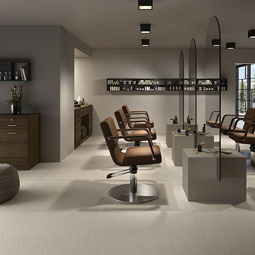 Barber shop realizzato con pavimento della Collezione Spring, variante Sand