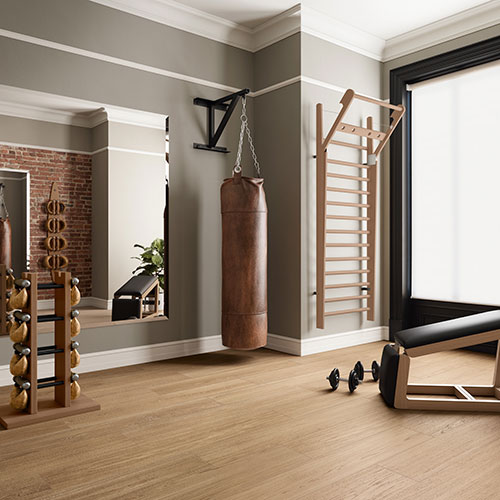 Ambiente palestra realizzato con pavimento della collezione W3, variante Class Nut
