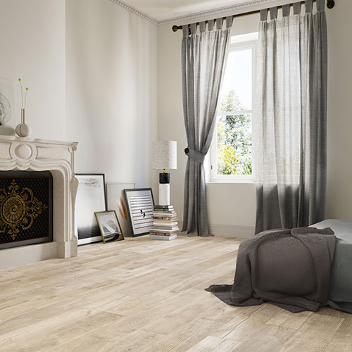 Ambiente camera realizzato con Pavimento della collezione W3, variante Patin Almond